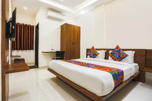 FabHotel Balaji Paradiseにあるベッド