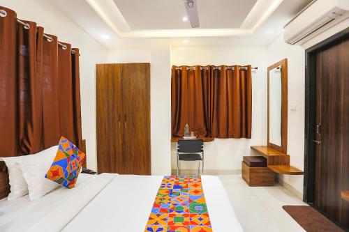 FabHotel Balaji Paradiseにあるベッド