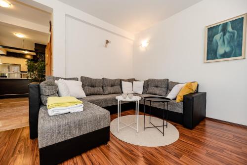 a living room with a couch and a table at Villa Heaven in Donji Zemunik