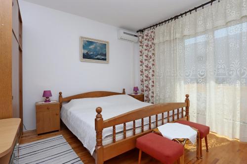 Postel nebo postele na pokoji v ubytování Apartments and rooms by the sea Banjol, Rab - 19692