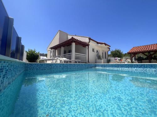 Family friendly house with a swimming pool Janjina, Peljesac - 19594