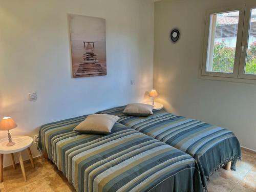 Posteľ alebo postele v izbe v ubytovaní Villa avec piscine privée à Sainte Lucie