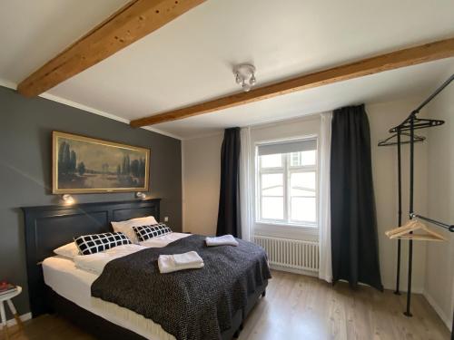 Postel nebo postele na pokoji v ubytování Old Town Luxury Apartment Akureyri