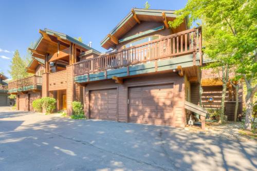 a large house with a garage and a balcony at Totally Tahoe Townhome in Crystal Bay