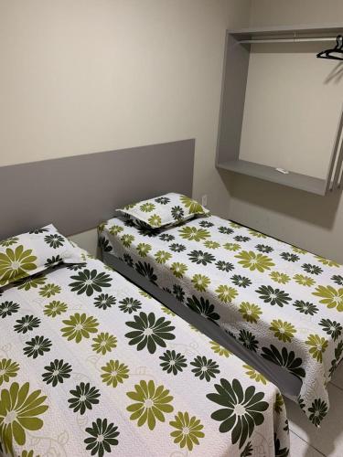 two beds sitting next to each other in a bedroom at Residencial Milagre 202 in Juazeiro do Norte