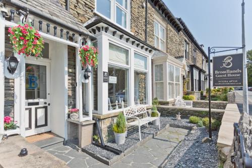 a building with a bench in front of it at Broadlands Windermere in Windermere