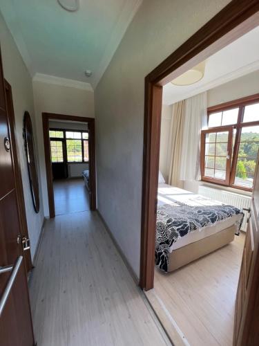 Ένα ή περισσότερα κρεβάτια σε δωμάτιο στο Kerpe Diem Otel