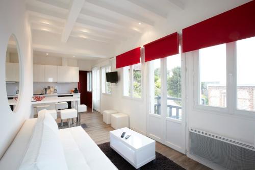 Katil atau katil-katil dalam bilik di Gite Gabrielle à Pourville: Appartement face à la mer