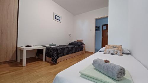 Ένα ή περισσότερα κρεβάτια σε δωμάτιο στο Dubrovnik Apartment Lasic