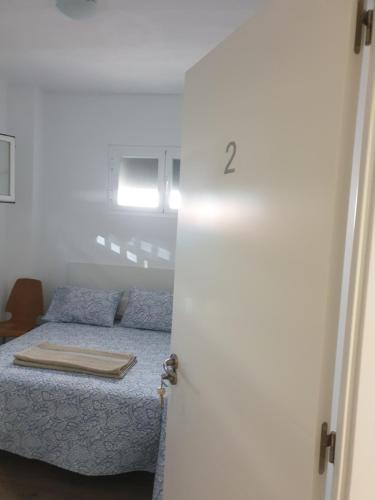 Postel nebo postele na pokoji v ubytování BELLADURMIENTE