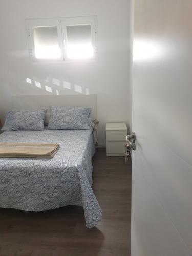Postel nebo postele na pokoji v ubytování BELLADURMIENTE