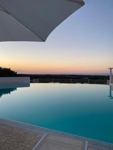 Bazén v ubytování Corte Di Ferro Hotel & Wellness Resort nebo v jeho okolí
