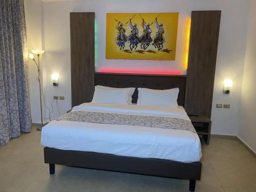 Katil atau katil-katil dalam bilik di Hotel Franco Yaounde