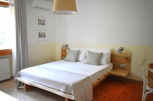 Giường trong phòng chung tại CividaleMia, casa vacanza
