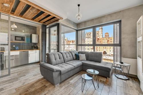 Granaria Premium Riverside & Parking by Downtown Apartments