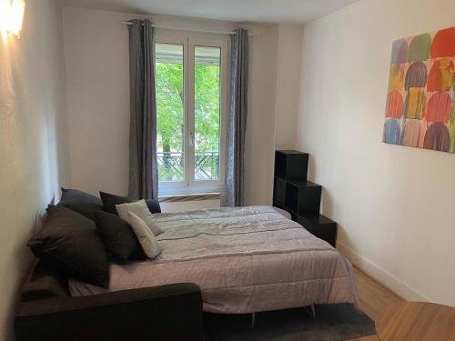 Posteľ alebo postele v izbe v ubytovaní Trendy 2 Rooms Paris 13