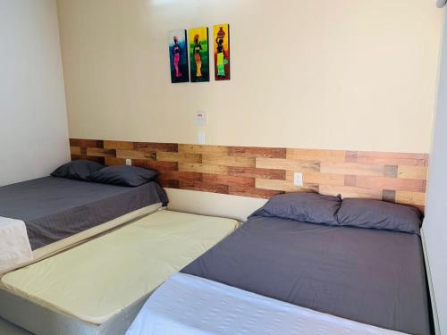 Ένα ή περισσότερα κρεβάτια σε δωμάτιο στο Casa campestre los cerezos