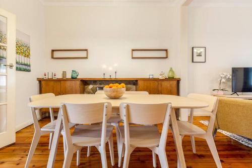 a dining room with a table and chairs at Comfortable Richmond home - Melbourne’s best location in Melbourne