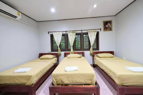 Postel nebo postele na pokoji v ubytování Hormuenlee resort