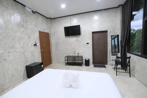 Postel nebo postele na pokoji v ubytování Hormuenlee resort