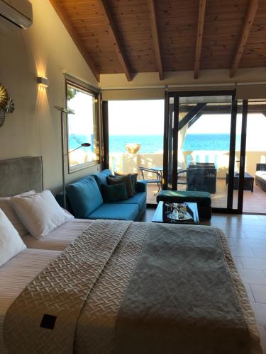 Posteľ alebo postele v izbe v ubytovaní Asterias Studios & Apartments