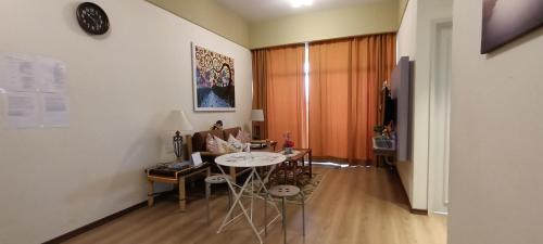 TV a/nebo společenská místnost v ubytování Sunshine Homestay