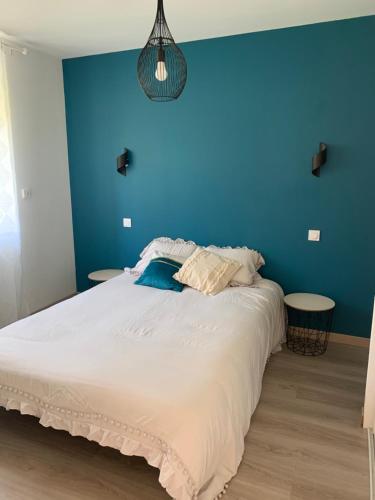 Postel nebo postele na pokoji v ubytování Gite chez Carolanne et Julien