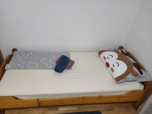 Postel nebo postele na pokoji v ubytování Apartman Ganic