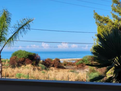 a view of the ocean from a window at Villa Marna Bianca in Borgo Bonsignore