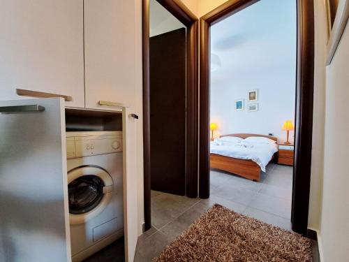 Ένα ή περισσότερα κρεβάτια σε δωμάτιο στο Flat with garden in Ioannina