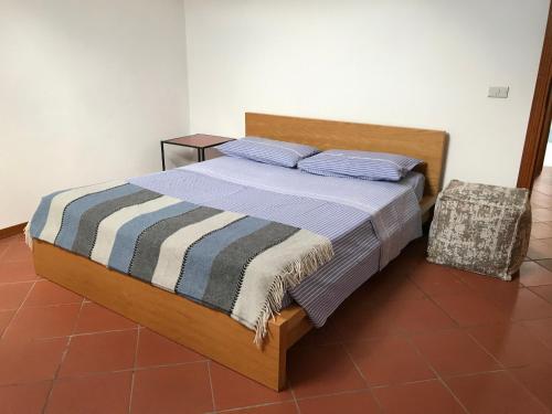 Ένα ή περισσότερα κρεβάτια σε δωμάτιο στο Casa di Luca