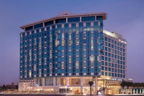 a tall building with a lot of windows at Crowne Plaza - Jeddah Al Salam by IHG in Jeddah