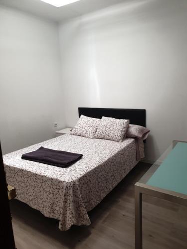 Postel nebo postele na pokoji v ubytování BELLADURMIENTE