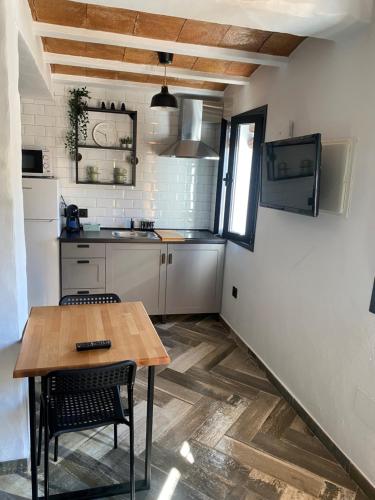 Kuchyňa alebo kuchynka v ubytovaní Casa Rural Bajo la Alcazaba