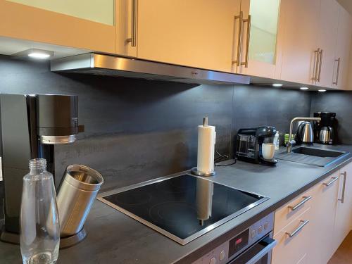 a kitchen with a sink and a counter top at bike & chill in Kleve