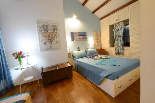 Postel nebo postele na pokoji v ubytování B&B Glicine