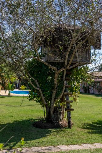 Taman di luar Pousada Recanto Trancoso