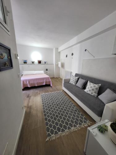 Säng eller sängar i ett rum på Residenza Solferino