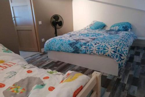 Posteľ alebo postele v izbe v ubytovaní Splendide appartement vue océan le Penon