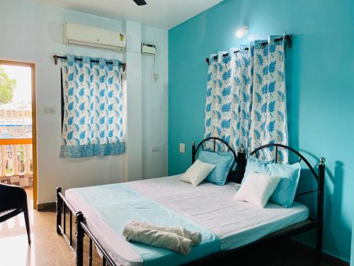 Кровать или кровати в номере Marina Guest House