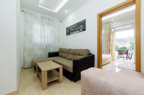 Posezení v ubytování Flori Apartments