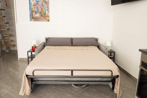 Postel nebo postele na pokoji v ubytování A due passi dal Duomo