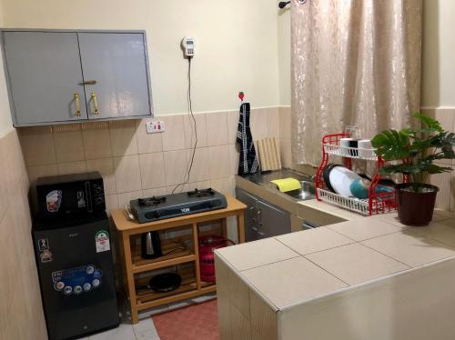 A cozinha ou cozinha compacta de Nanyuki Mostays