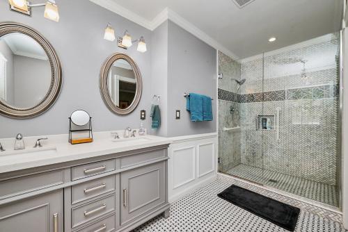 a bathroom with a sink and a shower at HOLIDAY HOME 5 BR 3 BA Near Beaches and Venues in Hampton