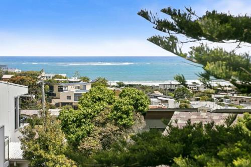 a view of the ocean from a building at Beachside Living with Sea Views at the Pines in Ocean Grove