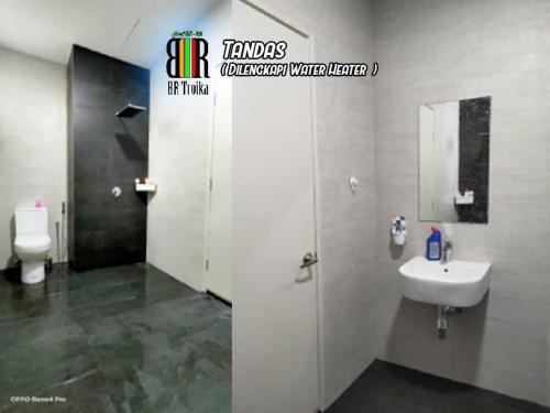 コタバルにあるBR Troika Homestayのバスルーム(洗面台、トイレ付)