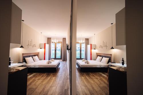 Postel nebo postele na pokoji v ubytování Wine Rock Hotel