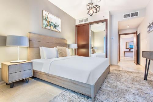 Postel nebo postele na pokoji v ubytování Icon Casa Living - Classy High Floor - Elite Residence