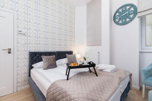 Posteľ alebo postele v izbe v ubytovaní Beautiful Apartments Kraków Dietla by Noclegi Renters