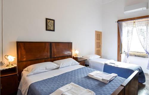 Postel nebo postele na pokoji v ubytování Gorgeous Home In Ragusa With Kitchen